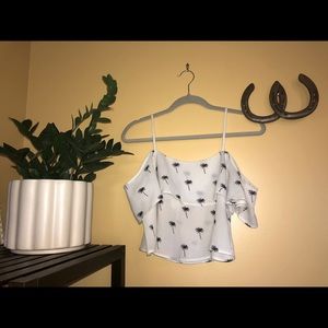 Cute palm tree print top. Cropped but flows.